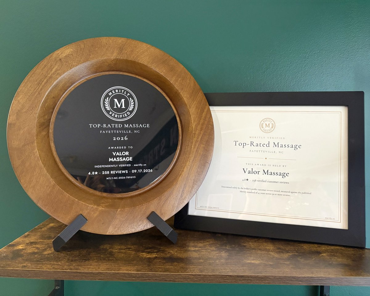 Meritly plaque and framed certificate on display at Valor Massage, Fayetteville, NC